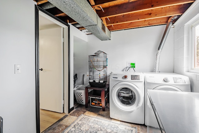 600 Kappler Rd, Heath, OH 43056 - laundry area with washer and clothes dryer and light stone finish floors