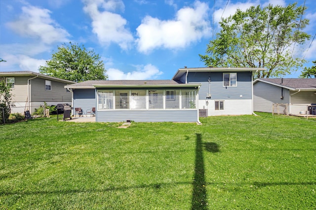 600 Kappler Rd, Heath, OH 43056 - back of house featuring a patio area, a yard, and a sunroom