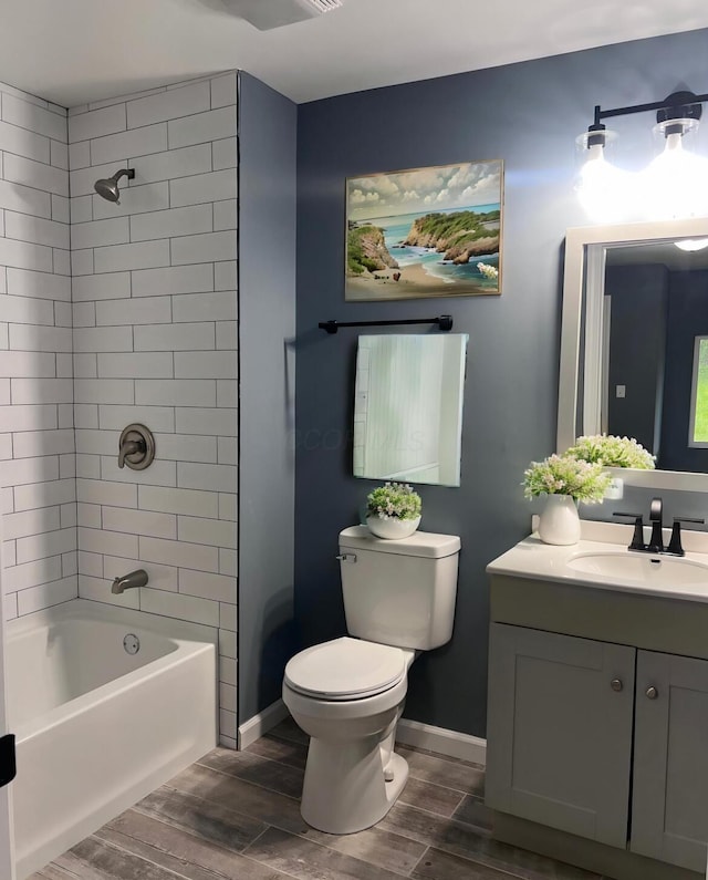 13212 Maple Rd NE, Thornville, OH 43076 - full bathroom with toilet, vanity, wood finished floors, and shower / bath combination