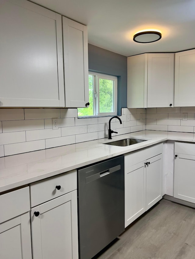 13212 Maple Rd NE, Thornville, OH 43076 - kitchen featuring dishwasher, a sink, tasteful backsplash, and white cabinetry