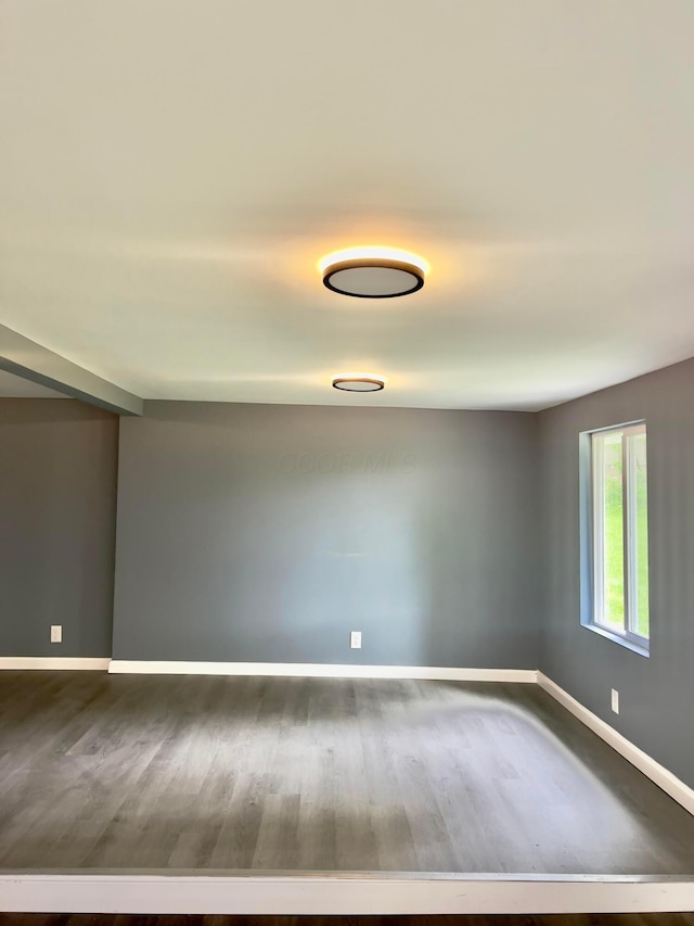 13212 Maple Rd NE, Thornville, OH 43076 - spare room featuring wood finished floors and baseboards