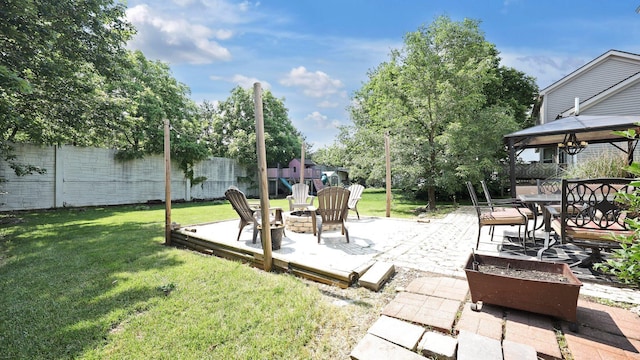7406 Murrayfield Dr, Columbus, OH 43085 - view of patio featuring a fire pit and a gazebo