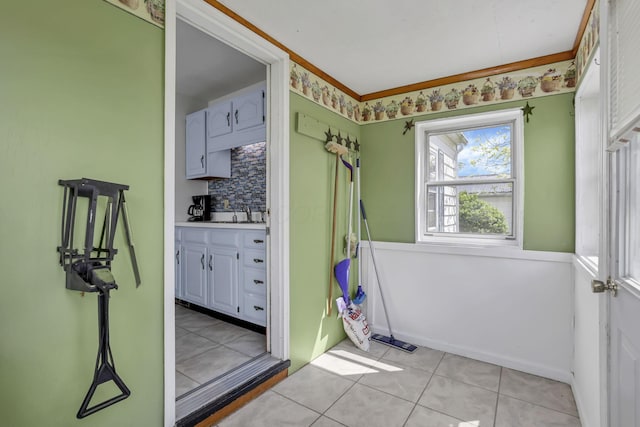 6880 Sandusky Ave, Chatfield, OH 44825 - doorway to outside featuring light tile patterned floors