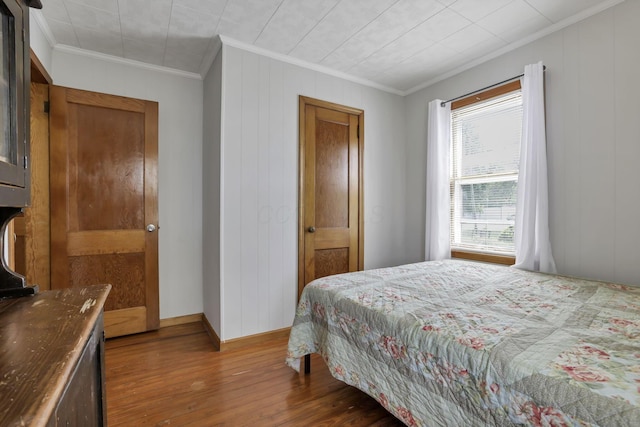 6880 Sandusky Ave, Chatfield, OH 44825 - bedroom with ornamental molding and hardwood / wood-style floors