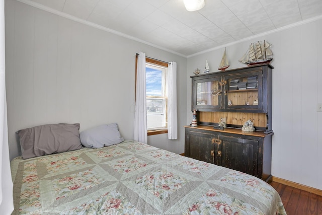 6880 Sandusky Ave, Chatfield, OH 44825 - bedroom with wood finished floors, ornamental molding, and baseboards