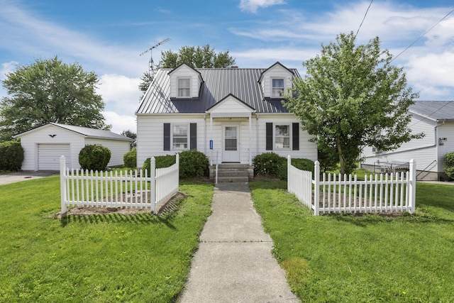6880 Sandusky Ave, Chatfield, OH 44825 - cape cod-style house with an outbuilding, a garage, and metal roof
