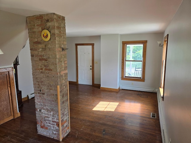 62 Scioto St, Powell, OH 43065 - entryway featuring a baseboard heating unit, a baseboard radiator, wood-type flooring, and baseboards