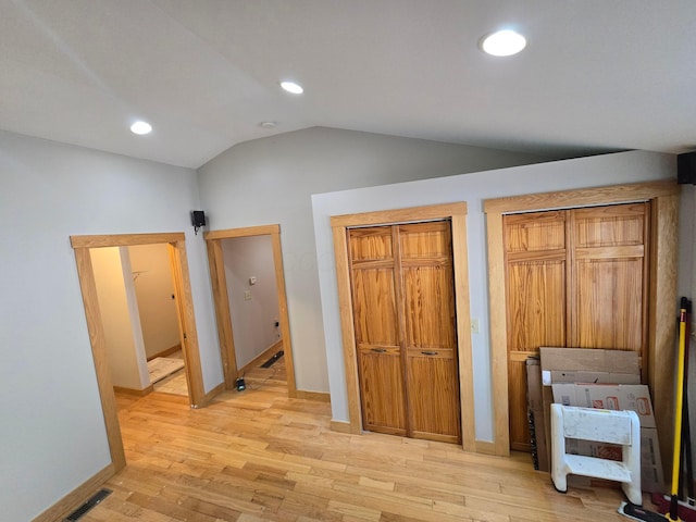 62 Scioto St, Powell, OH 43065 - unfurnished bedroom with vaulted ceiling, light wood-style floors, recessed lighting, and baseboards