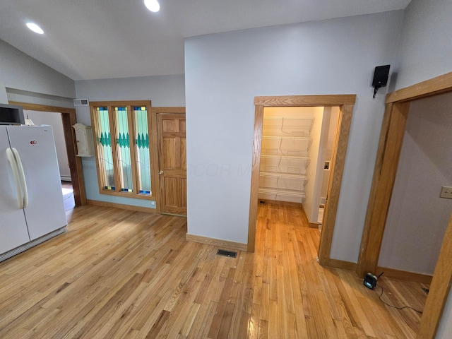 62 Scioto St, Powell, OH 43065 - unfurnished bedroom featuring freestanding refrigerator, light wood-style floors, baseboards, and recessed lighting