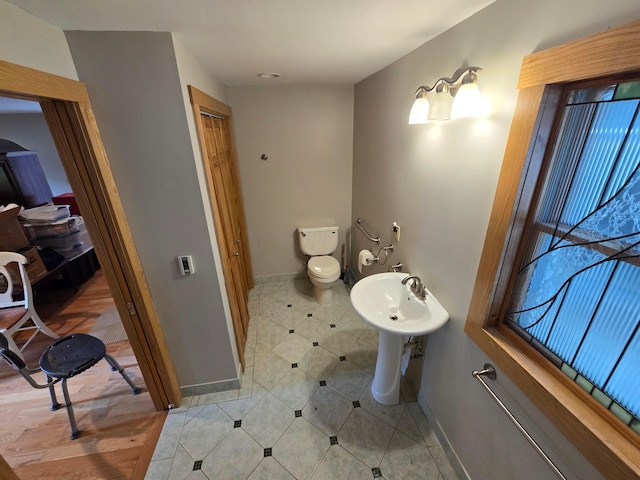 62 Scioto St, Powell, OH 43065 - bathroom featuring toilet and baseboards