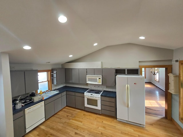 62 Scioto St, Powell, OH 43065 - kitchen with white appliances, dark countertops, gray cabinets, light wood finished floors, and recessed lighting