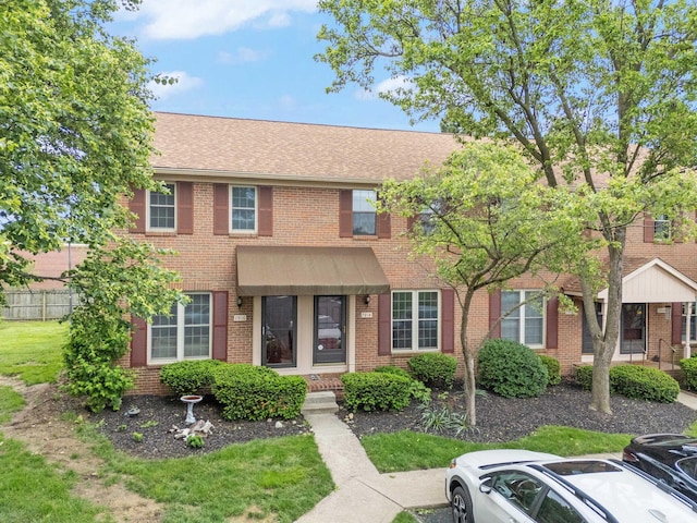 7914 Verandah Ct Unit 61, Powell, OH 43065 - multi unit property with brick siding, a shingled roof, and uncovered parking