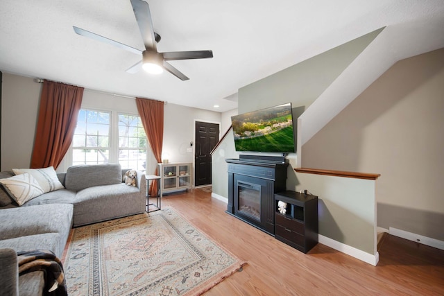 7914 Verandah Ct Unit 61, Powell, OH 43065 - living area with wood finished floors, a ceiling fan, and baseboards