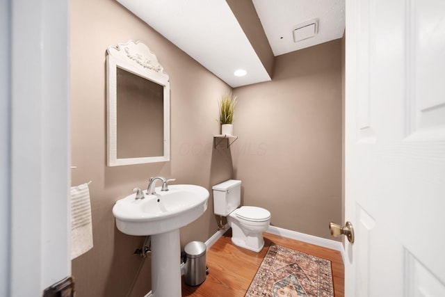 7914 Verandah Ct Unit 61, Powell, OH 43065 - half bathroom with toilet, wood finished floors, and baseboards