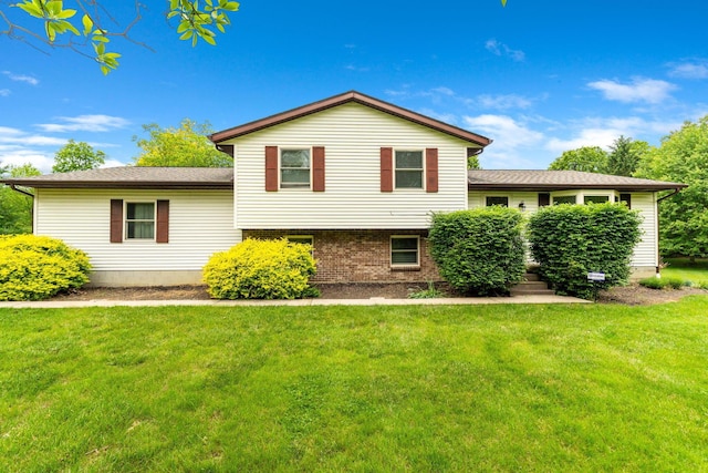 5081 Carters Corner Rd, Sunbury, OH 43074 - rear view of house featuring a lawn and brick siding