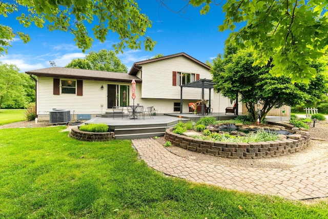 5081 Carters Corner Rd, Sunbury, OH 43074 - back of house featuring a yard, a deck, and central air condition unit