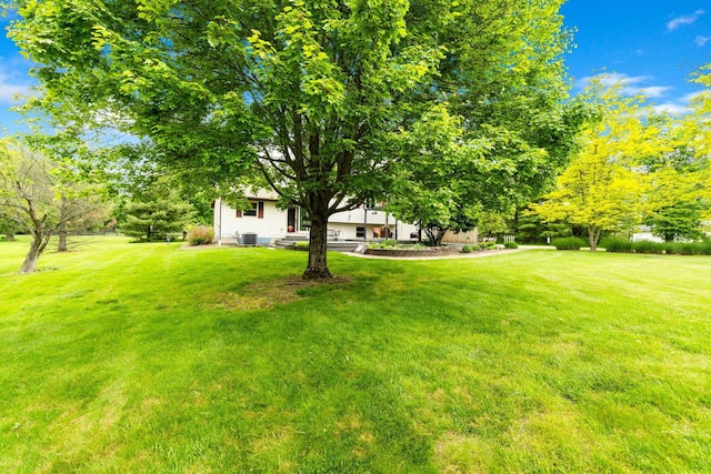 5081 Carters Corner Rd, Sunbury, OH 43074 - view of green lawn with central AC