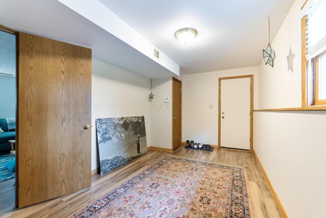 5081 Carters Corner Rd, Sunbury, OH 43074 - entrance foyer with wood finished floors and baseboards