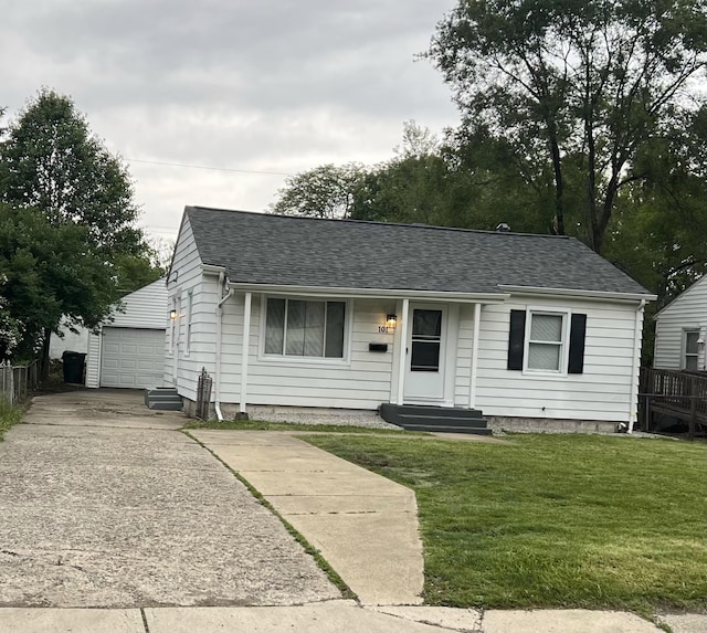 101 N James Rd, Columbus, OH 43213 - view of front of property with entry steps, an outdoor structure, and roof with shingles