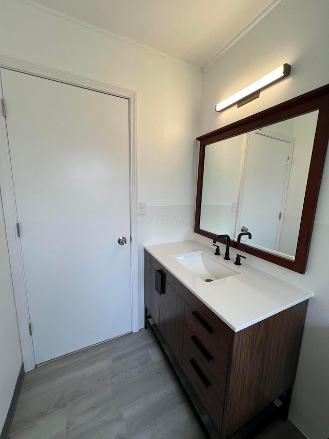101 N James Rd, Columbus, OH 43213 - bathroom with vanity and wood finished floors