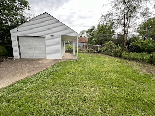 101 N James Rd, Columbus, OH 43213 - view of yard with a detached garage, an outdoor structure, and driveway