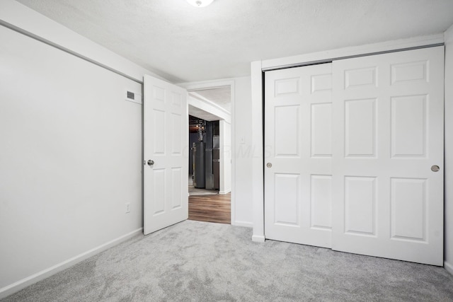 3783 Laguna Dr, Columbus, OH 43232 - unfurnished bedroom featuring carpet floors, baseboards, and a closet