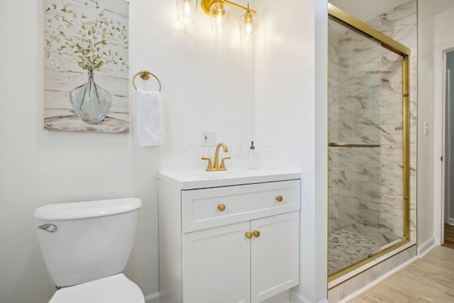 3783 Laguna Dr, Columbus, OH 43232 - full bathroom featuring a shower stall, toilet, and vanity