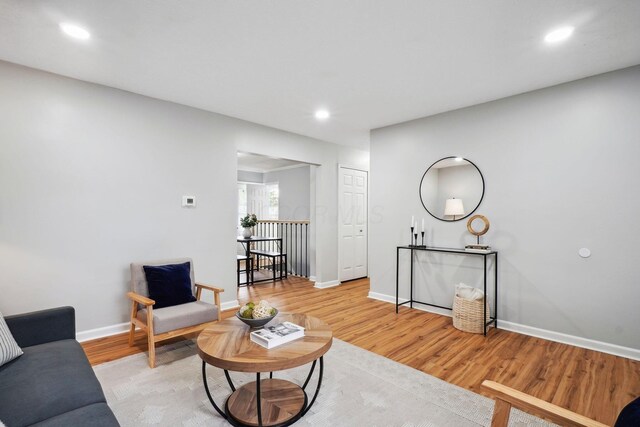 3783 Laguna Dr, Columbus, OH 43232 - living room with light wood finished floors, baseboards, and recessed lighting