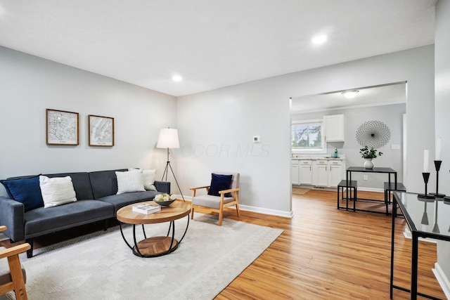 3783 Laguna Dr, Columbus, OH 43232 - living room with light wood-style flooring, baseboards, and recessed lighting