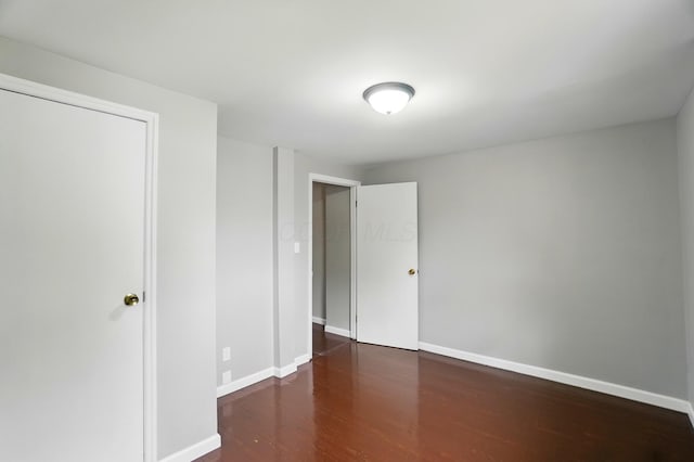 760-762 Kelton Ave, Columbus, OH 43205 - unfurnished bedroom with wood finished floors and baseboards