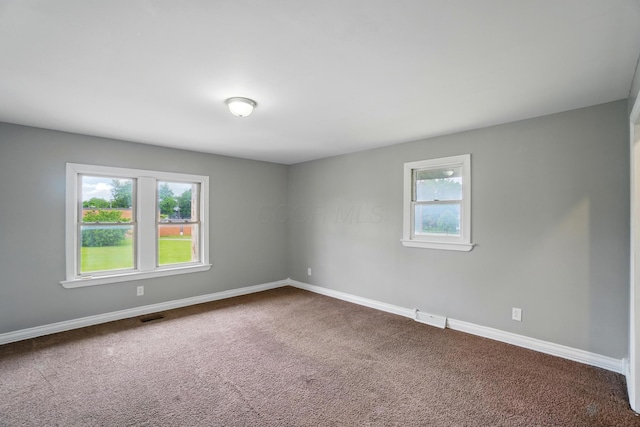 760-762 Kelton Ave, Columbus, OH 43205 - unfurnished room with dark colored carpet and baseboards