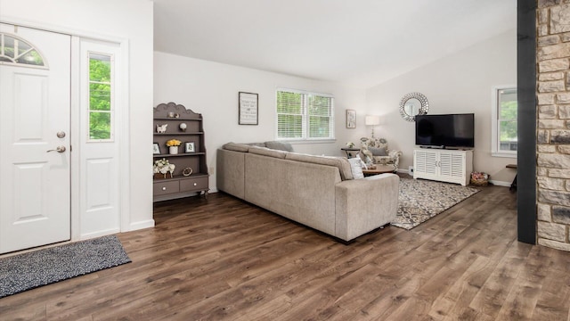 2145 Welsh Hills Rd NE, Granville, OH 43023 - living room featuring dark wood-style floors, vaulted ceiling, and baseboards