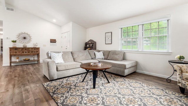 2145 Welsh Hills Rd NE, Granville, OH 43023 - living room featuring wood finished floors, lofted ceiling, and baseboards