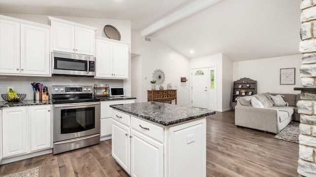 2145 Welsh Hills Rd NE, Granville, OH 43023 - kitchen with appliances with stainless steel finishes, decorative backsplash, open floor plan, light wood-style floors, and recessed lighting