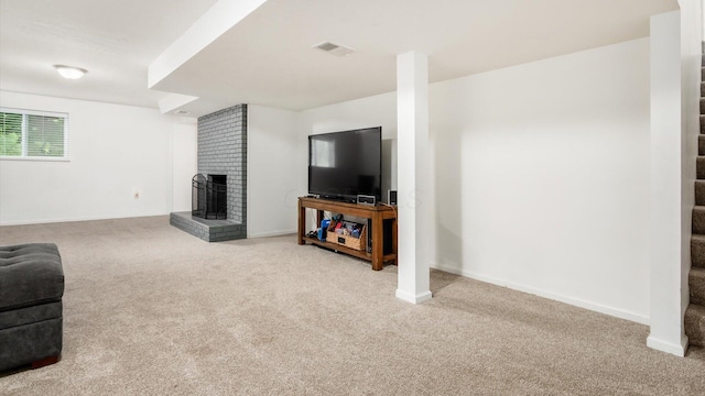 2145 Welsh Hills Rd NE, Granville, OH 43023 - living area with carpet floors, stairway, and a brick fireplace