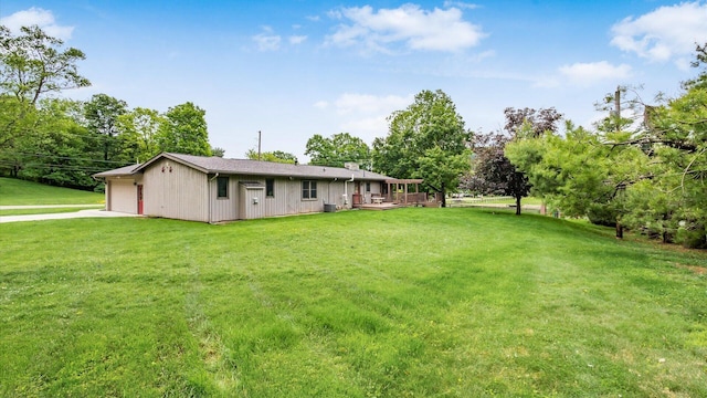 2145 Welsh Hills Rd NE, Granville, OH 43023 - view of grassy yard featuring driveway and a deck