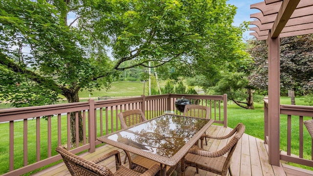 2145 Welsh Hills Rd NE, Granville, OH 43023 - deck with outdoor dining space and a lawn