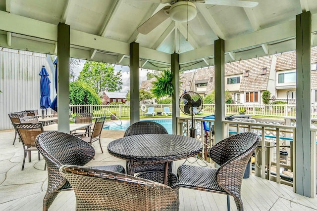 4945 Walnut Rd Unit 6, Buckeye Lake, OH 43008 - view of patio with outdoor dining area, ceiling fan, a community pool, and a wooden deck