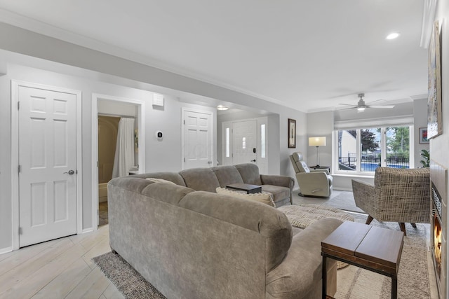 4945 Walnut Rd Unit 6, Buckeye Lake, OH 43008 - living room featuring ornamental molding, light wood-type flooring, ceiling fan, baseboards, and recessed lighting