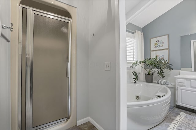 4945 Walnut Rd Unit 6, Buckeye Lake, OH 43008 - bathroom featuring a shower stall, vaulted ceiling, a tub with jets, vanity, and tile patterned flooring