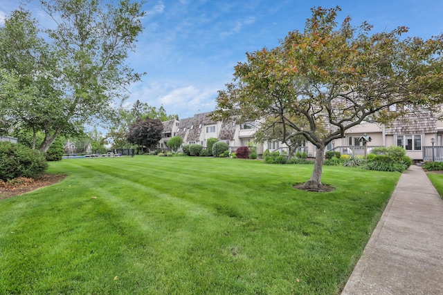 4945 Walnut Rd Unit 6, Buckeye Lake, OH 43008 - view of green lawn featuring a residential view