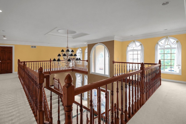 736 Eton St, Marion, OH 43302 - corridor with an upstairs landing, a chandelier, carpet floors, crown molding, and recessed lighting