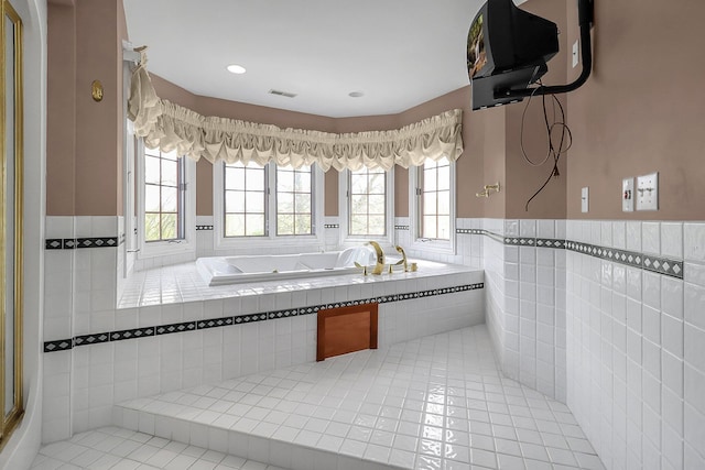 736 Eton St, Marion, OH 43302 - full bathroom with a bath, tile patterned floors, wainscoting, and tile walls