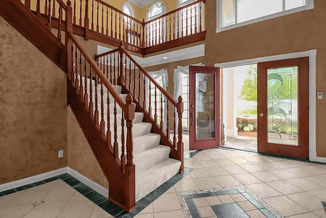 736 Eton St, Marion, OH 43302 - foyer entrance featuring baseboards, inlaid floor details, and plenty of natural light