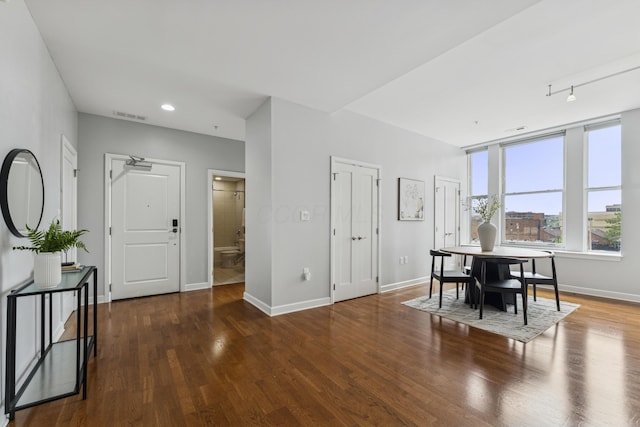 145 N High St Unit 300, Columbus, OH 43215 - dining room featuring baseboards and wood finished floors
