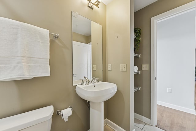 145 N High St Unit 300, Columbus, OH 43215 - bathroom with toilet and baseboards