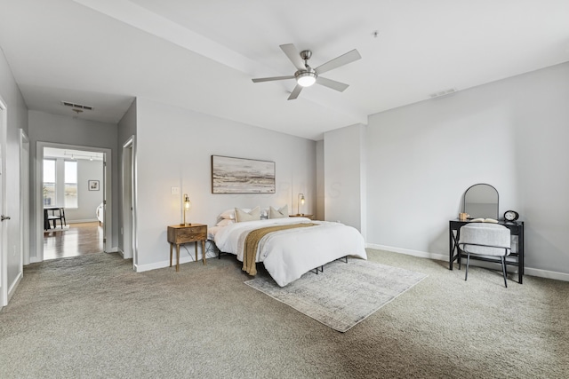 145 N High St Unit 300, Columbus, OH 43215 - bedroom with carpet, baseboards, and a ceiling fan