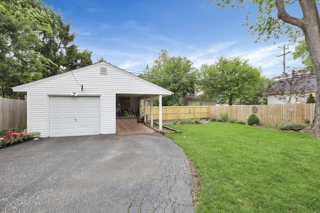 1470 Berkshire Rd, Columbus, OH 43221 - detached garage featuring asphalt driveway