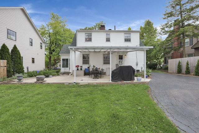 1470 Berkshire Rd, Columbus, OH 43221 - rear view of house with a patio area and a chimney