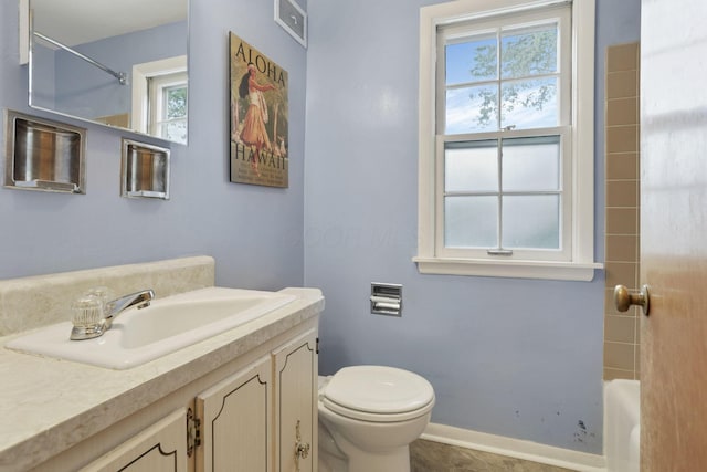 1470 Berkshire Rd, Columbus, OH 43221 - full bathroom with vanity, toilet, shower / bathtub combination, and baseboards